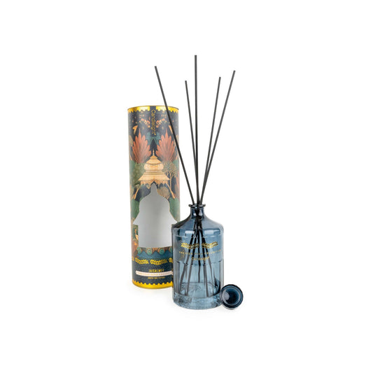 Reed diffuser set with decorative packaging on a white background