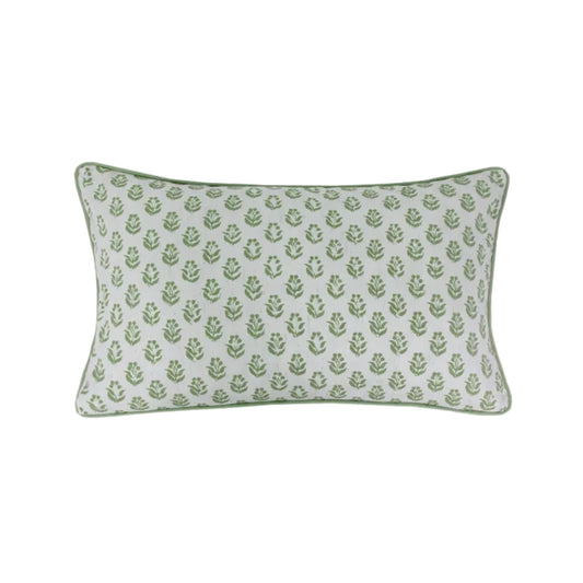Green patterned pillow on a white background