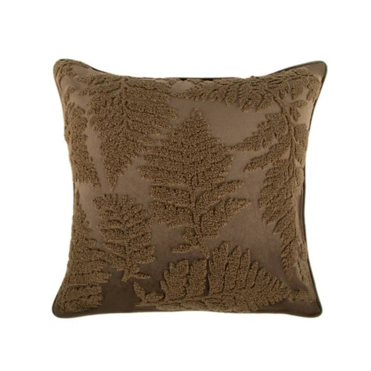 Green textured pillow with leaf pattern on a white background