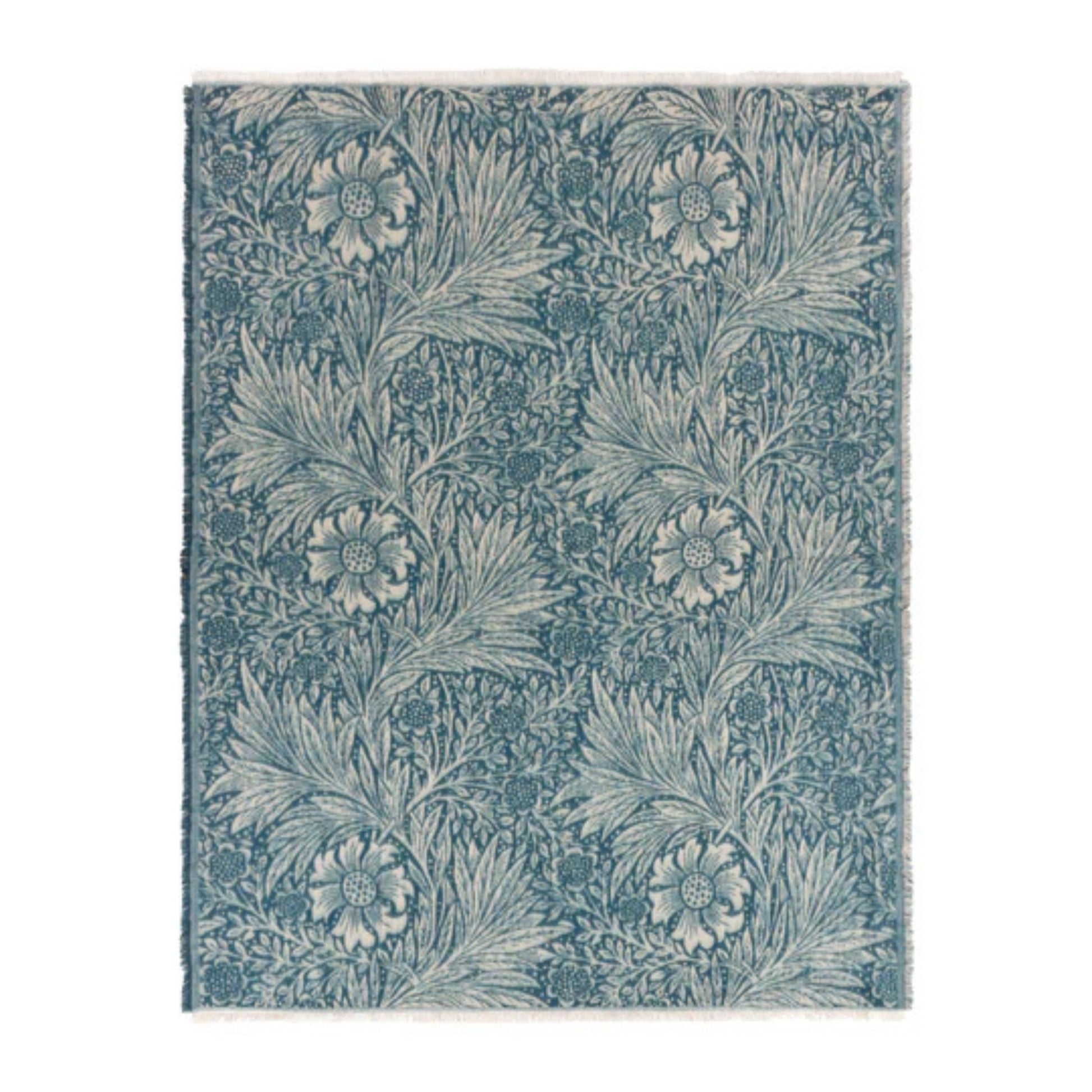 Floral patterned rug with indigo blue and cream colours on a white background