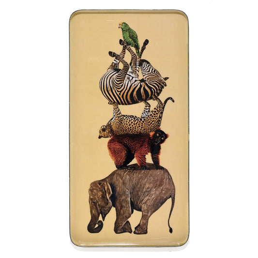 A decorative metal tray with a humorous stacked animal design on the bottom, including a zebra, leopard, and elephant, on a yellow background.