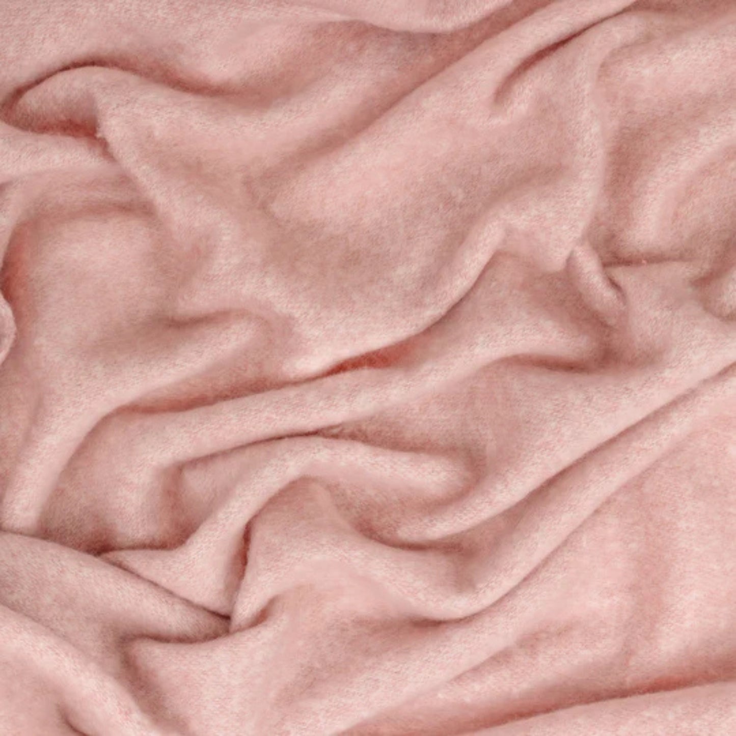 Close-up of pink fabric with folds