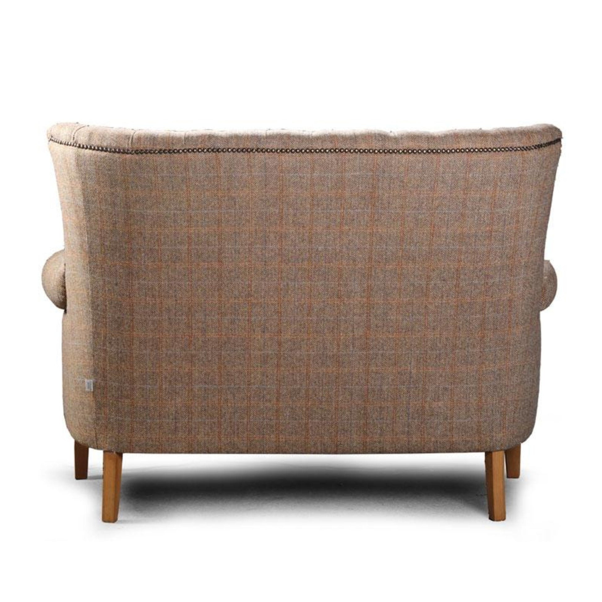 Brown tweed sofa on a white background