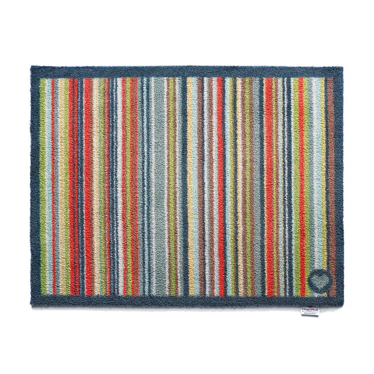Washable Hug Rug doormat with a vibrant colourful striped design 