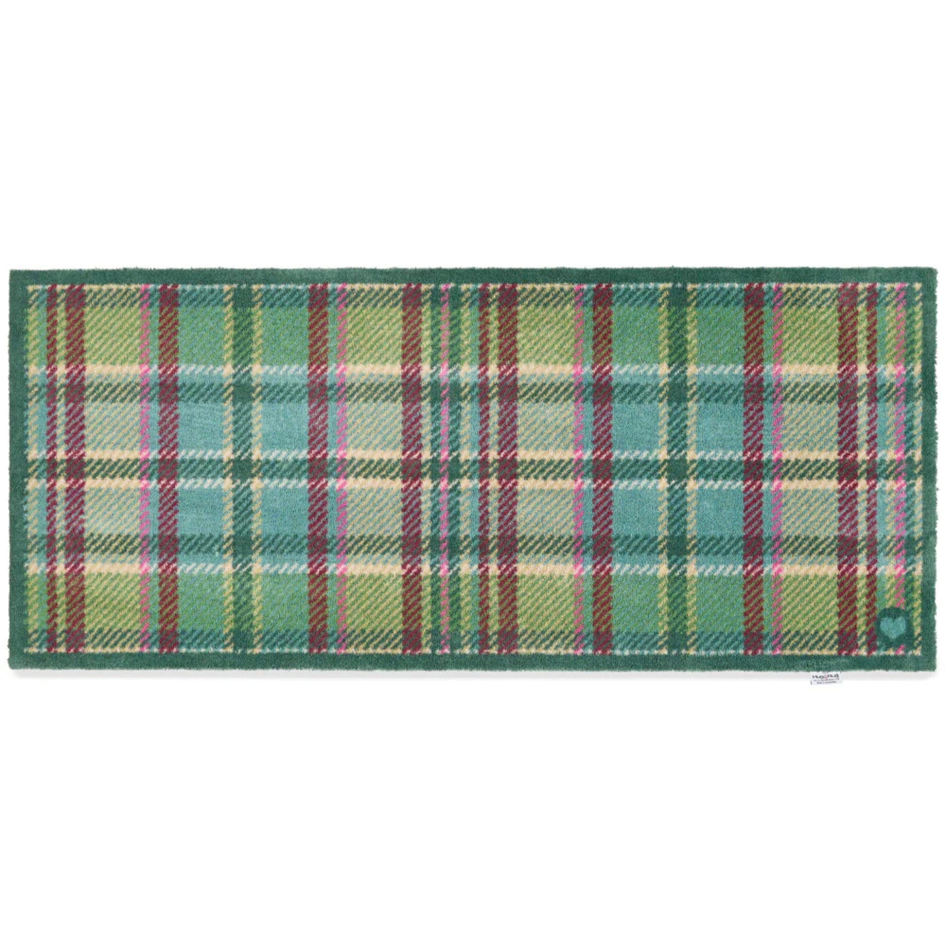 Plaid patterned rug with green and pink colors on a white background