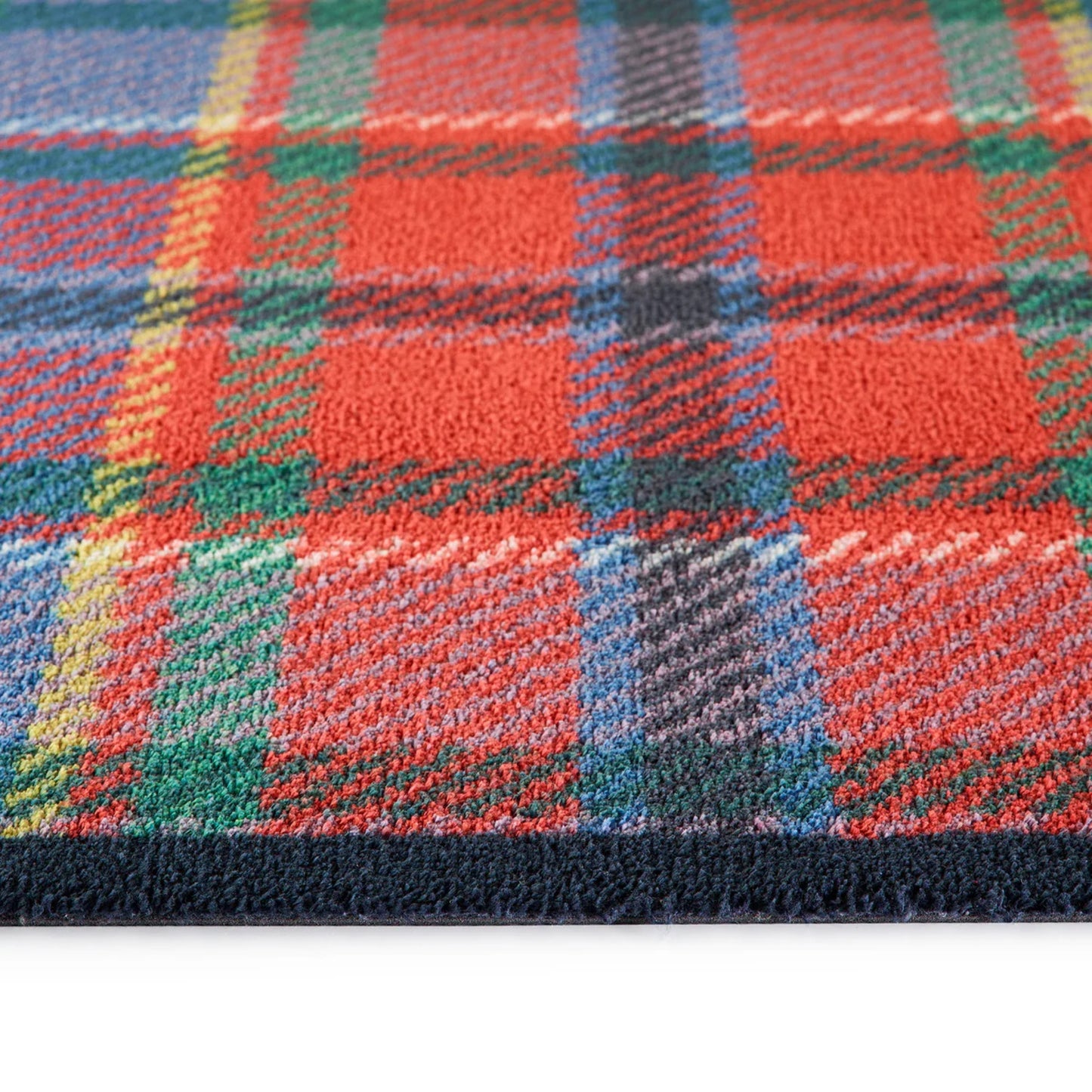 Red tartan rug close up 
