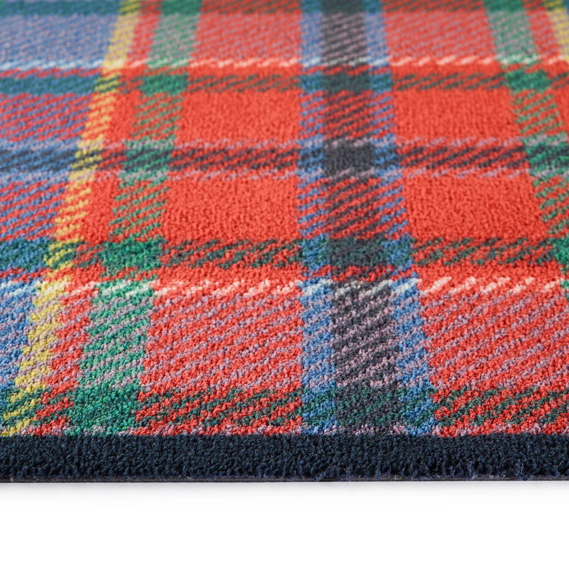 Red tartan rug close up 