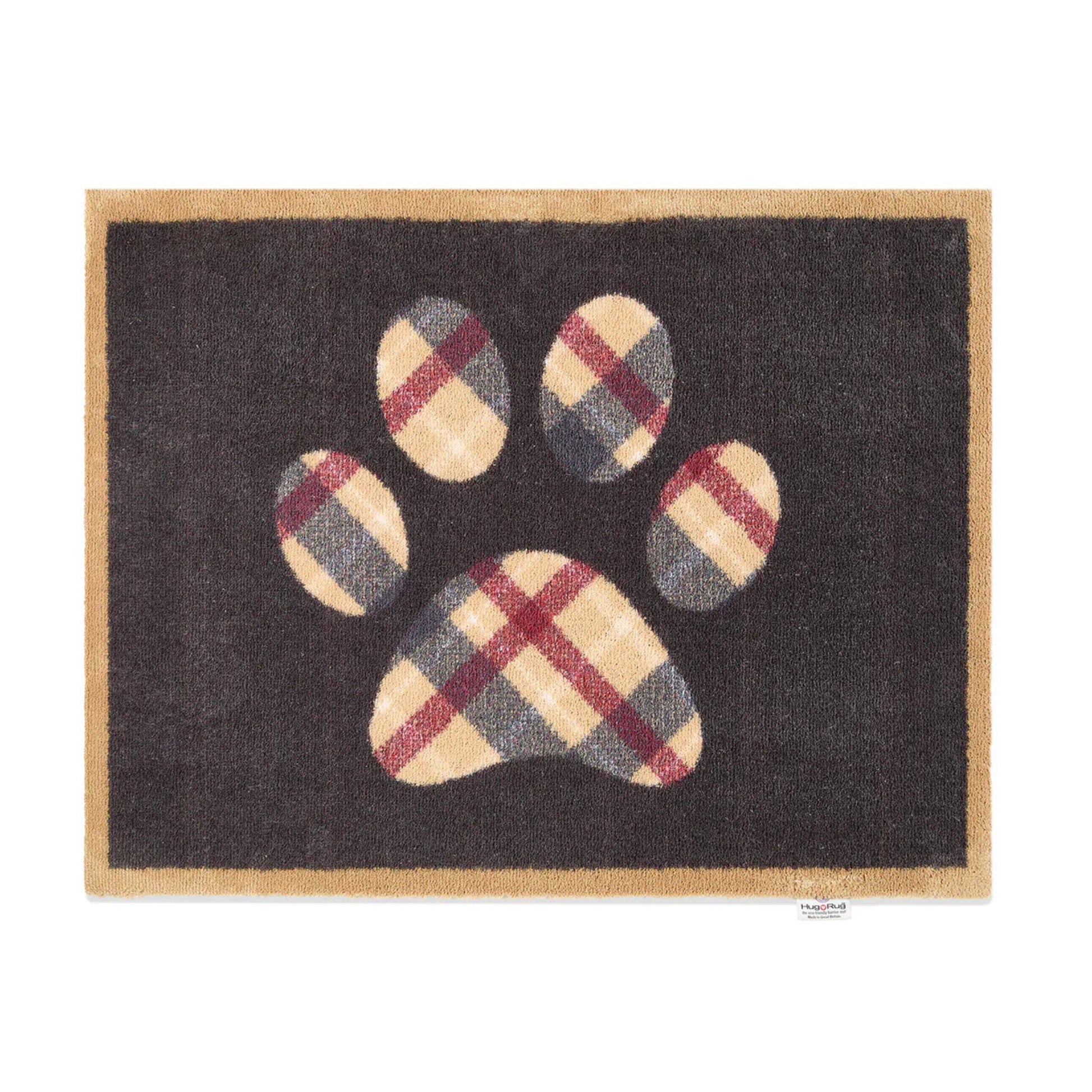 Doormat with plaid paw design on a black background
