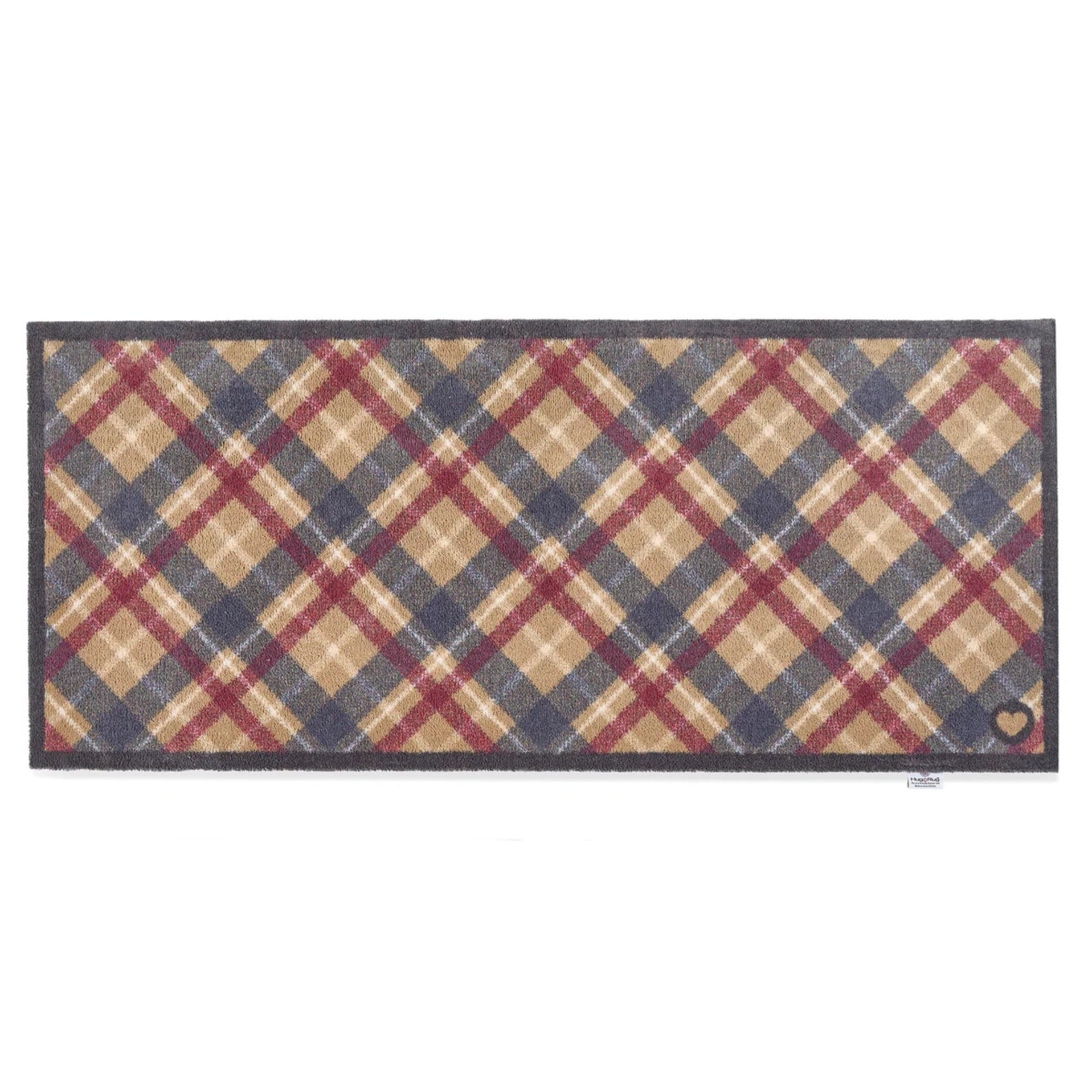 Plaid patterned rug with red, blue, and beige colors on a white background