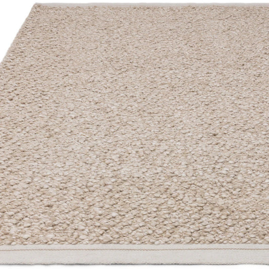 Taupe rug with a subtle texture 