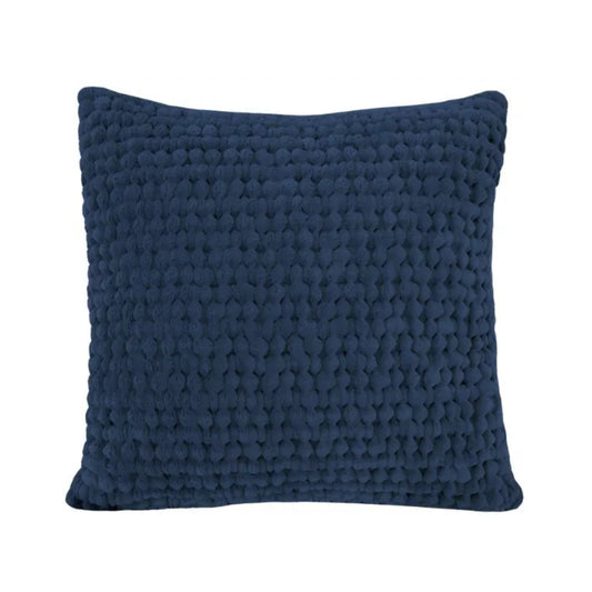 Blue textured pillow on a white background