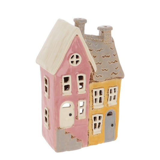Pottery handpainted terrace tealight house on a white background