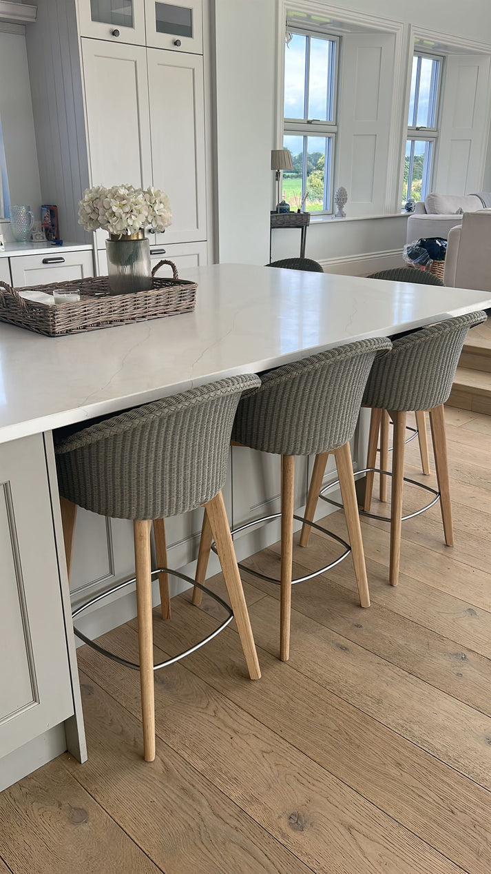 The Avril Counter Stool is a lovely counter stool in delicate Lloyd Loom weave with a beautifully crafted oak wood base.undefined