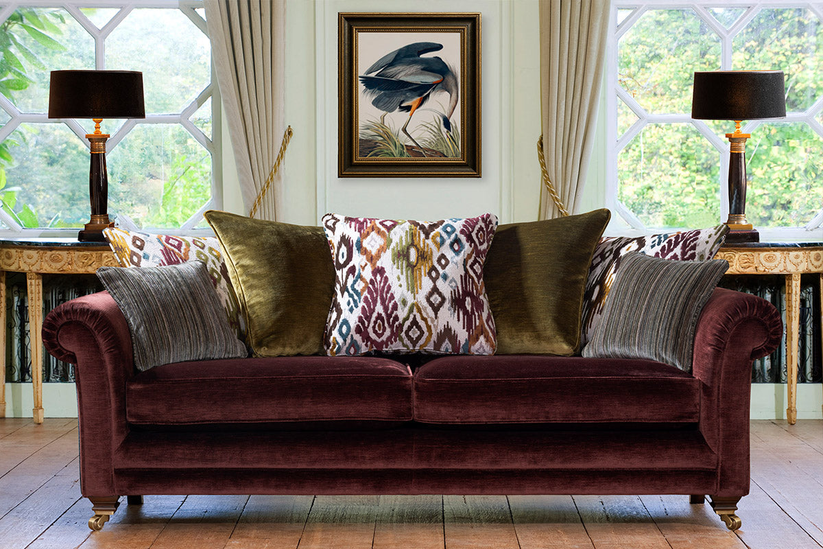 Charlbury Grand Sofa, pillow back, antique/brushed brass castor legs
