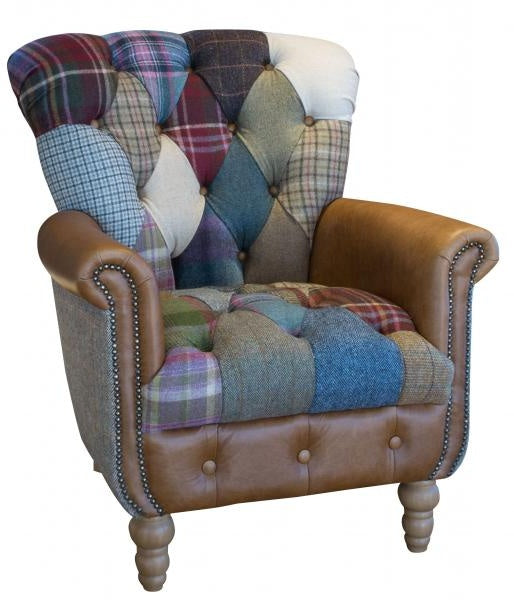 patchwork arm chair with leather arms and button detail 