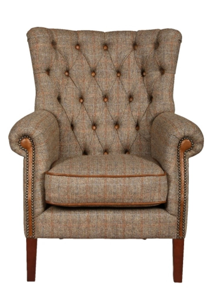 Harris tweed armchair with leather button detail